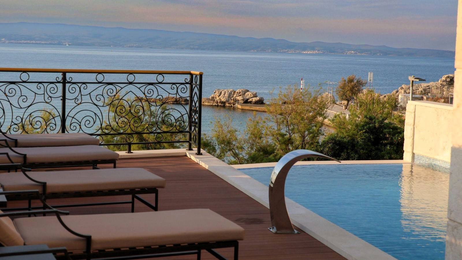 Luxurious hotel pool overlooking Antalya coastline